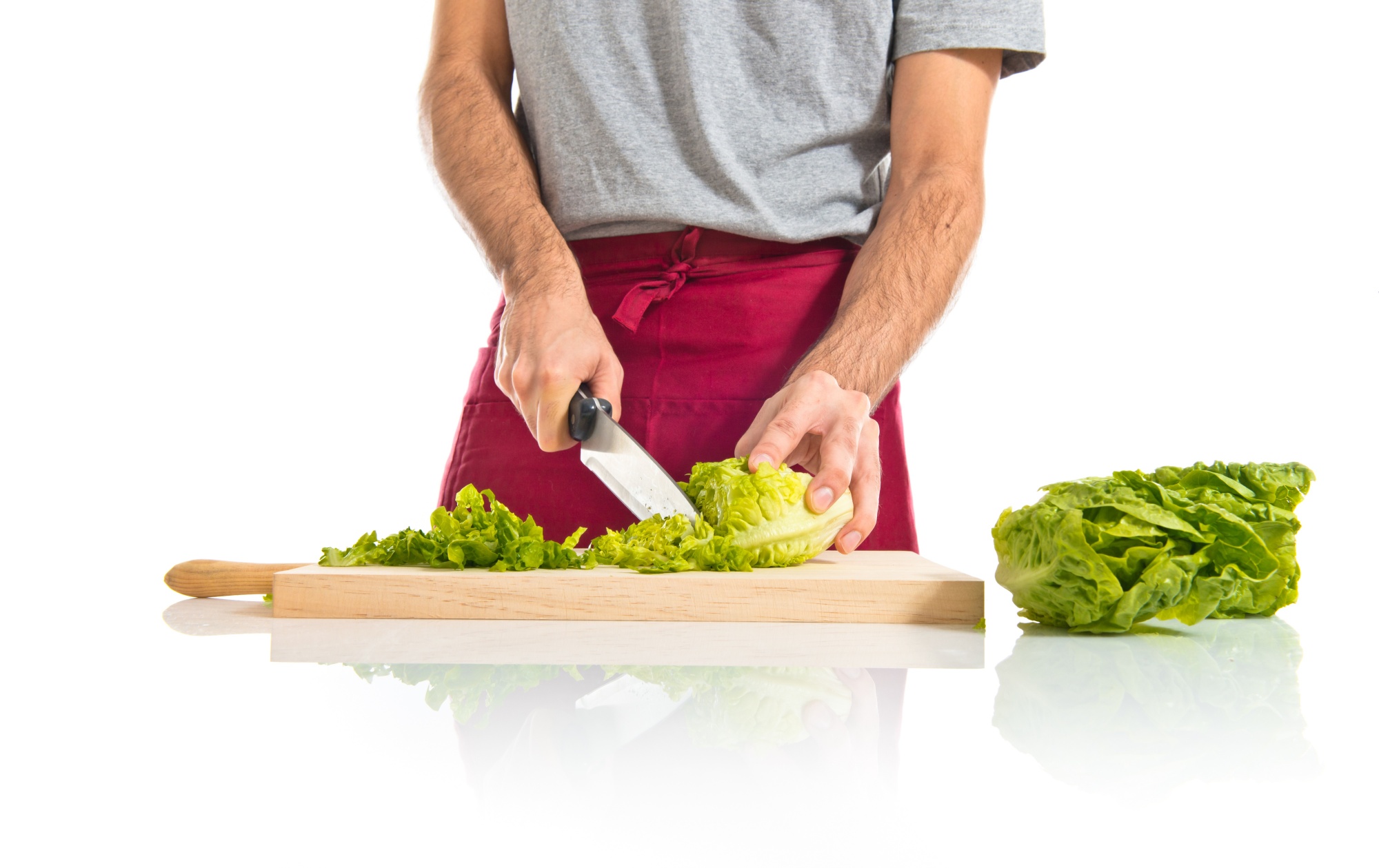 Closeup hands chopping vegetables